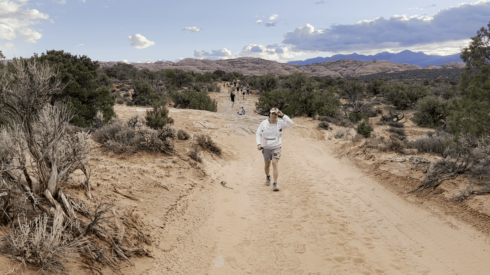 Gentle Tiger founder running the Arches Ultra 50k in Moab